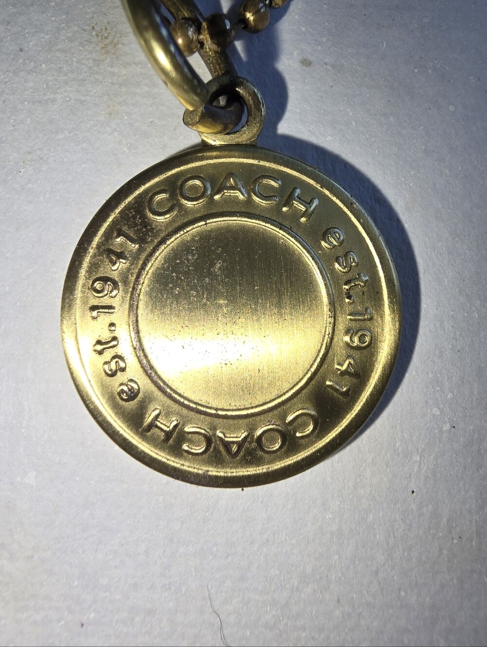 Coach Gold Tone Pendant Est 1941